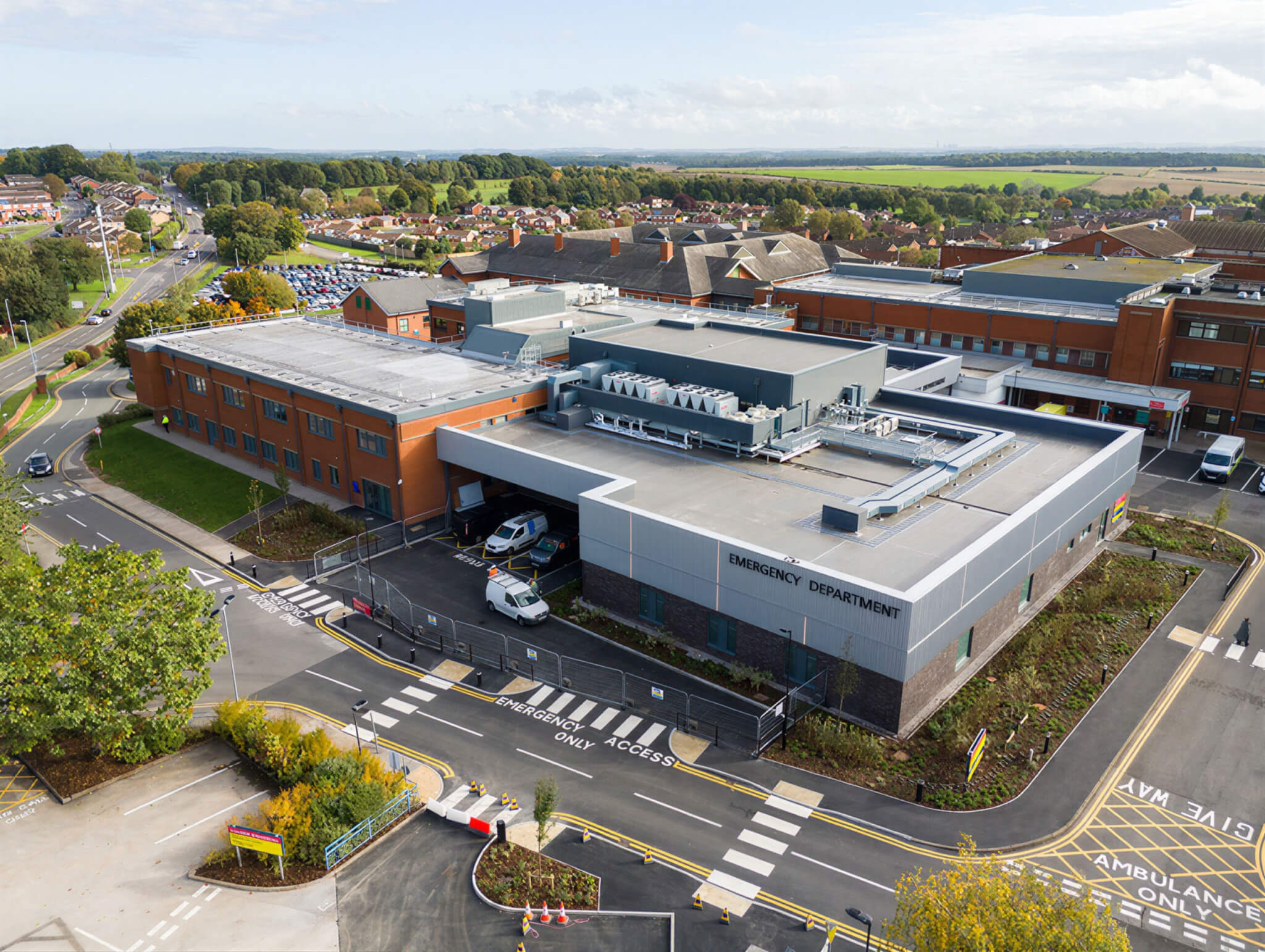 Aerial view of Bassetlaw Hospital Emergency Care Village showing the new emergency department building and roof-mounted plant